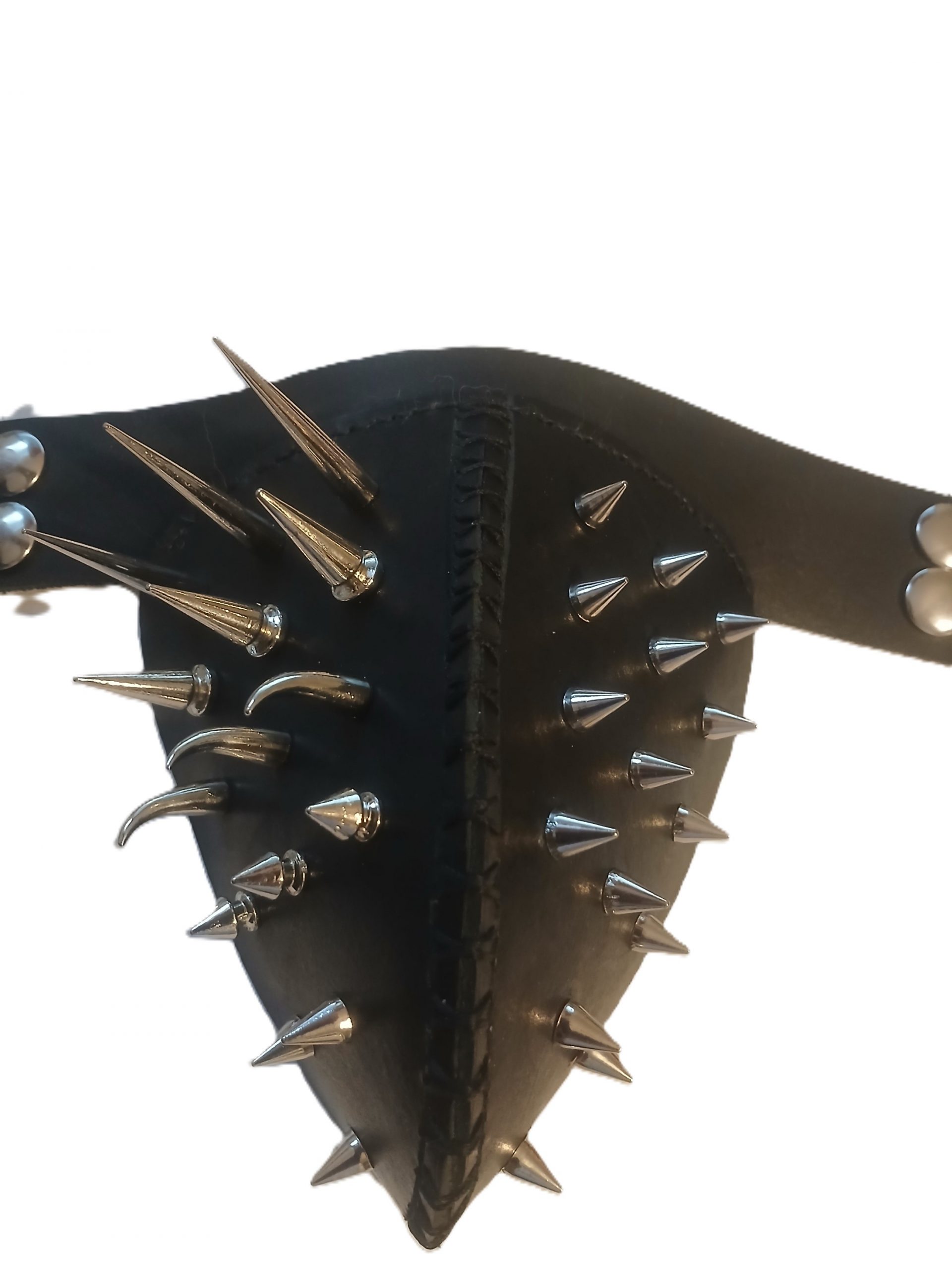 A mens jockstrap made of leather and what appears to be about 6 different kind of steel studs sticking out of the pouch.